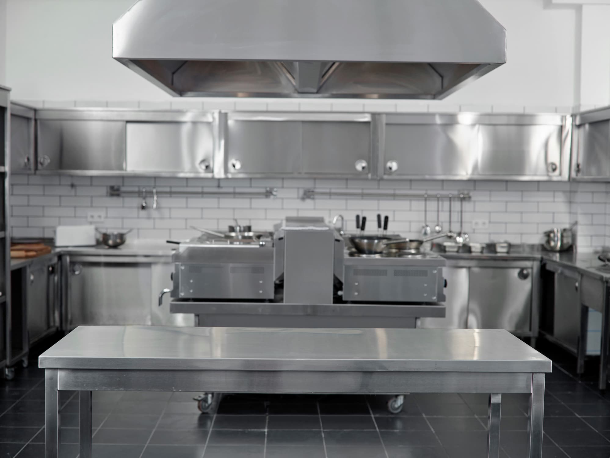 a commercial kitchen, all stainless steel